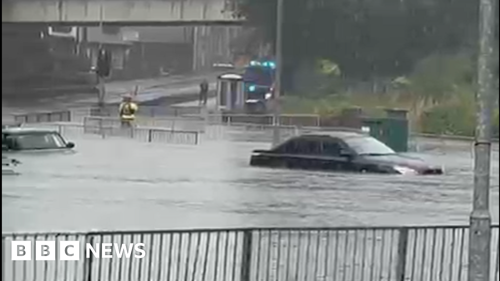 Flooding hits Swansea roundabout after heavy rain across Wales