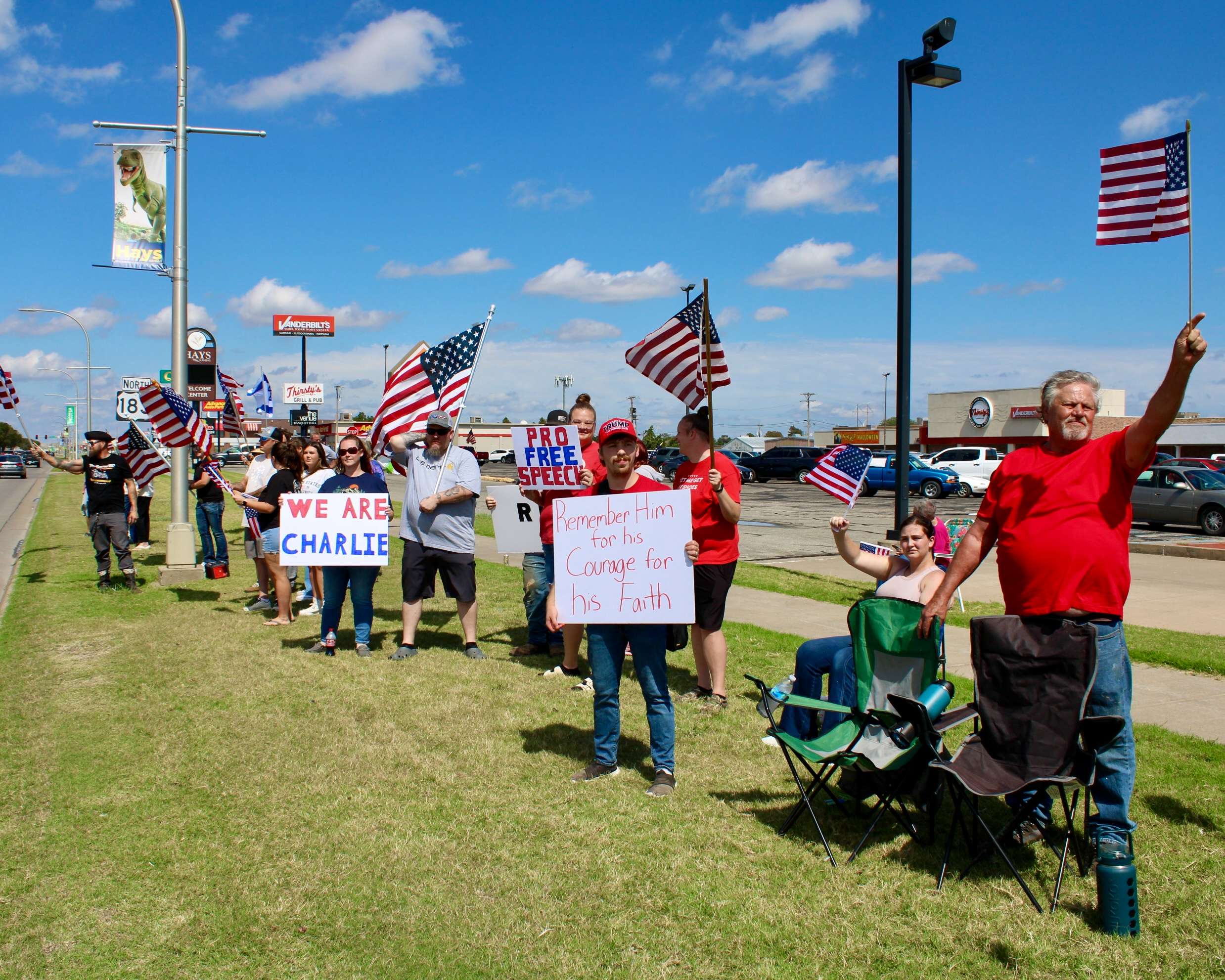Attendees on the corner of 27th and Vine in Hays. Photo by Tony Guerrero/Hays Post