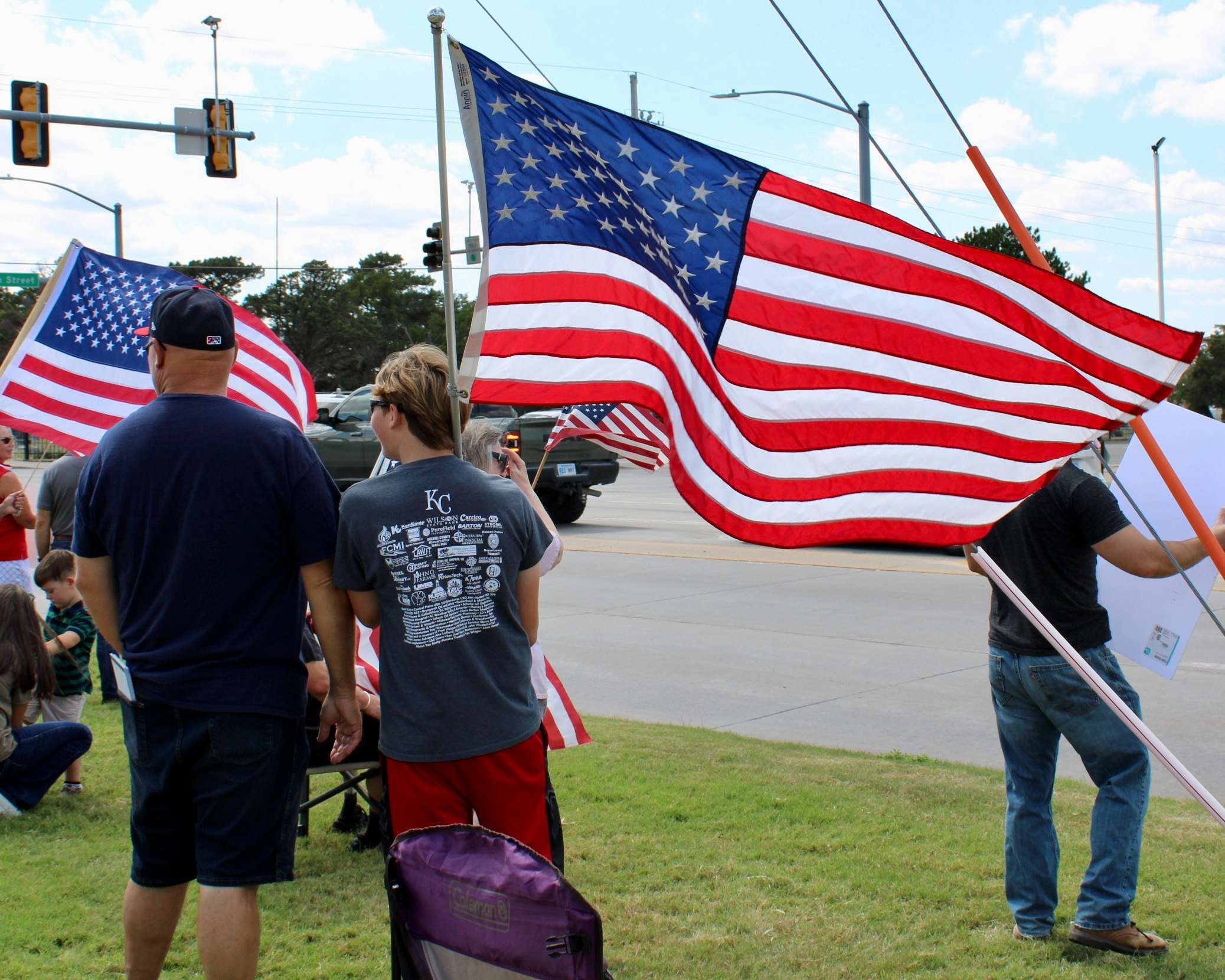 An attendee on the corner of 27th and Vine. Photo By Tony Guerrero/Hays Post