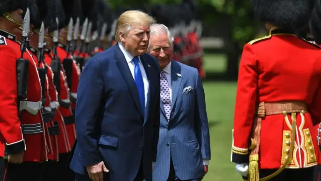 US President Donald Trump and Prince Charles, Prince of Wales inspect an honour guard during a welcome ceremony at Buckingham Palace in central London on June 3, 2019, on the first day of their three-day State Visit to the UK.