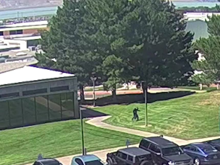 A still from a video released by the FBI of the shooter in Utah Valley. The subject is seen jumping from the rooftop of a building after the shooting. Around 12 p.m. Mountain Time on September 10, 2025.