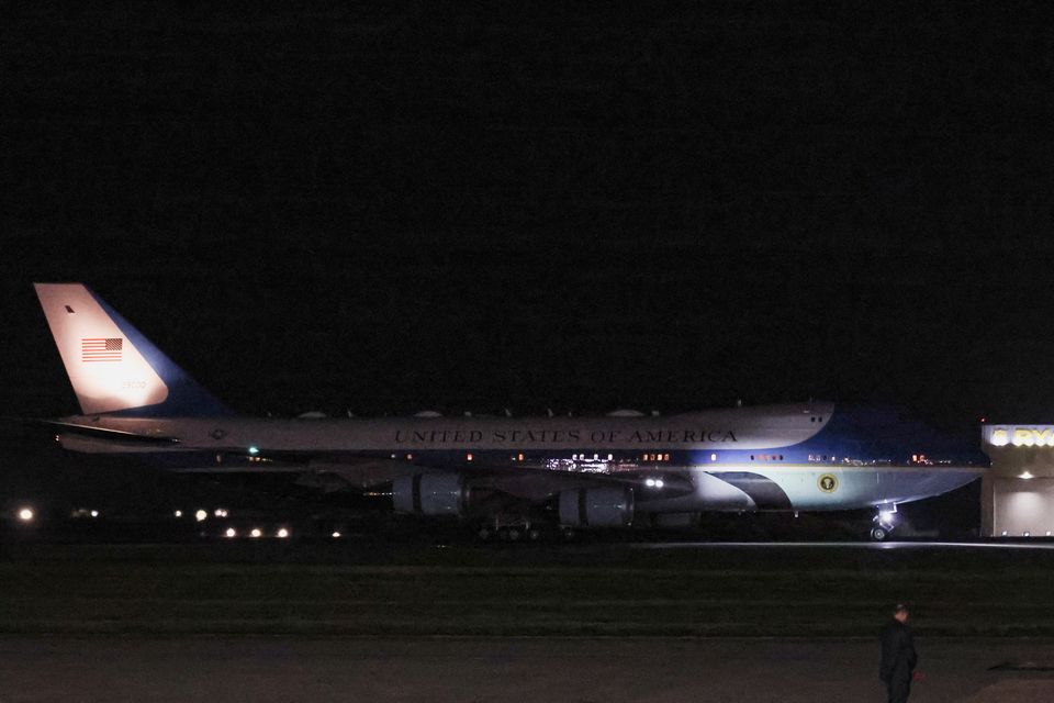 US president Donald Trump and first lady Melania Trump arrive aboard Air Force One for their state visit to Britain (REUTERS/Chris Radburn)