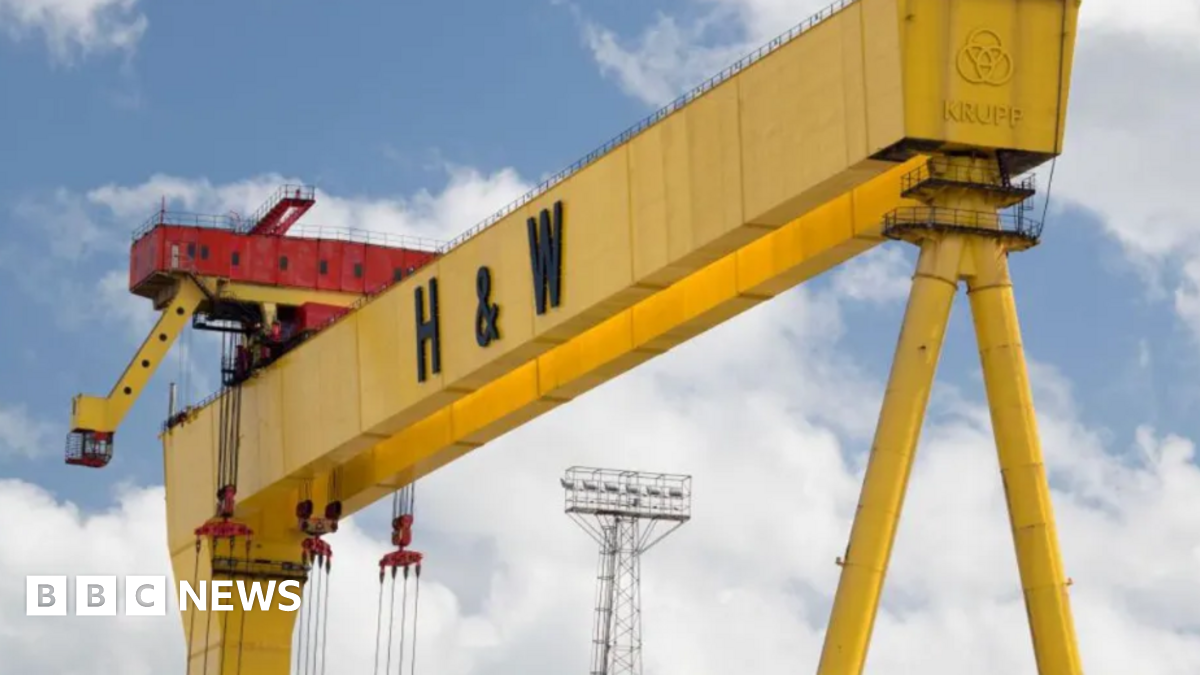 A Harland & Wolff crane against a blue sky