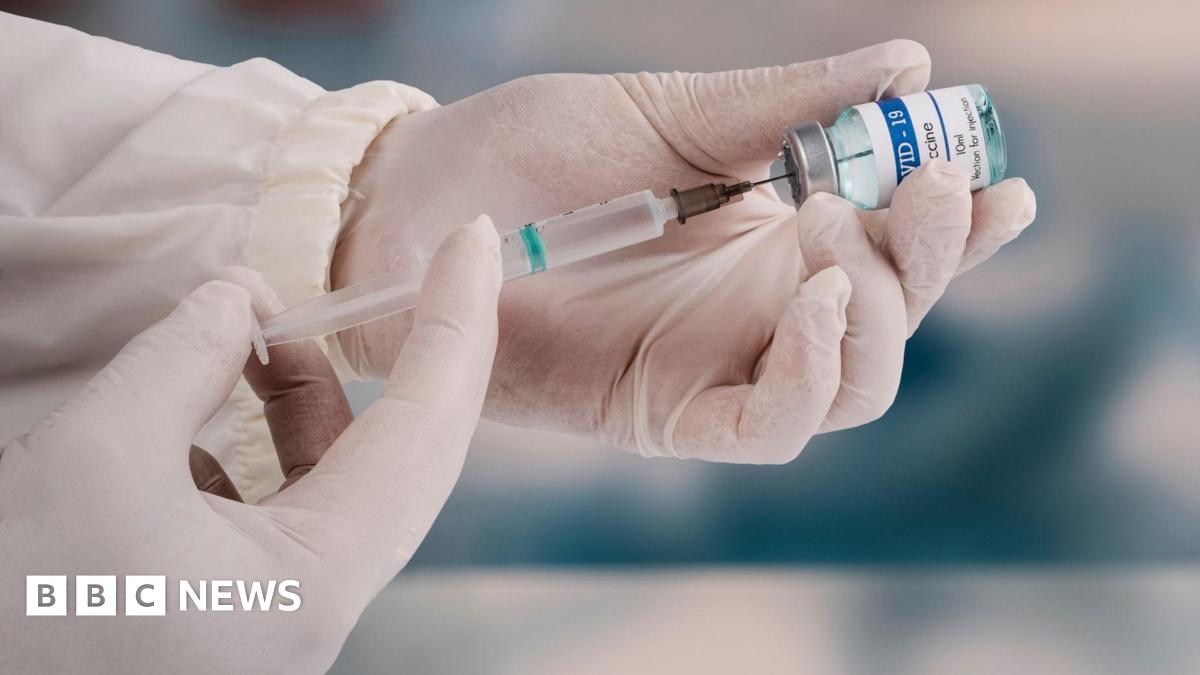 Mom and four-year-old son smile at camera