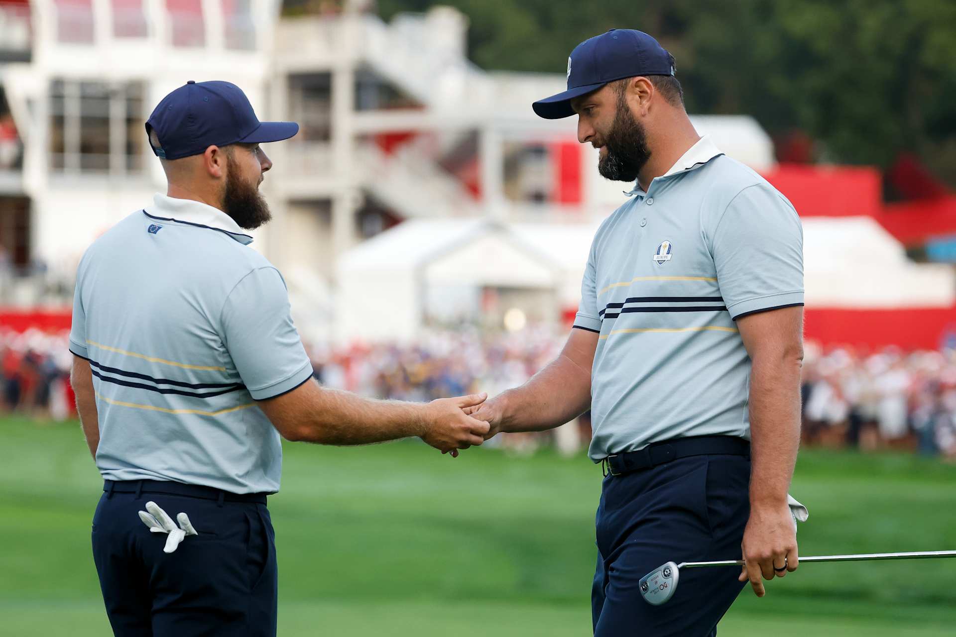 FARMINGDALE, NEW YORK - SEPTEMBER 26: Tyrrell Hatton and Jon Rahm of Team Europe react on the first green during the Friday morning foursomes matches of the 2025 Ryder Cup at Black Course at Bethpage State Park Golf Course on September 26, 2025 in Farmingdale, New York. (Photo by Harry How/Getty Images)