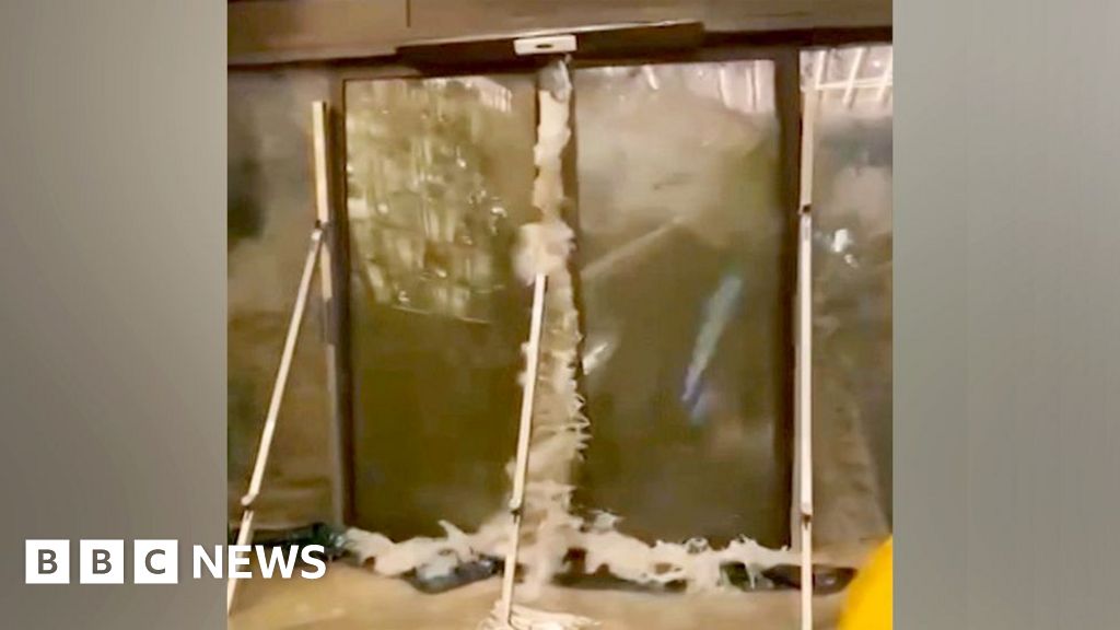 Social media footage shows water smashing through Hong Kong hotel