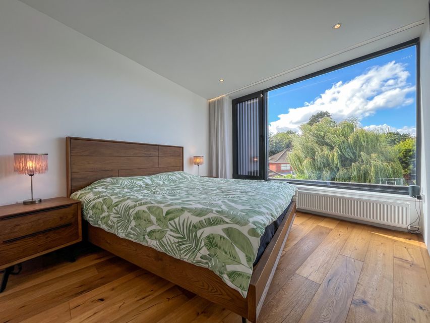 One of three bedrooms