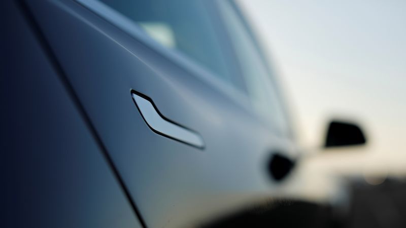 Tesla is looking to redesign its door handles following trapped-passenger reports