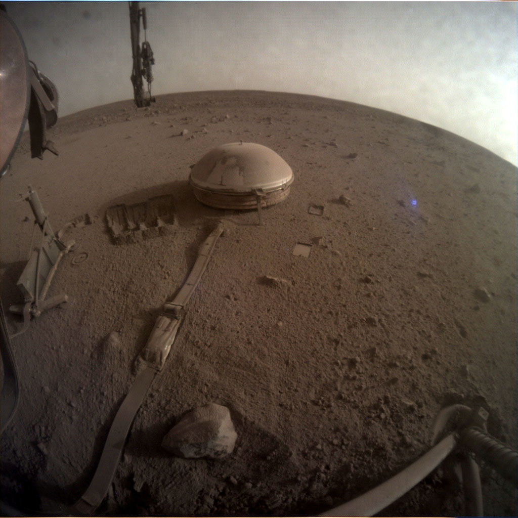 View of the InSight's seismometer on the Martian surface, in one of the last images taken by NASA's InSight Mars lander