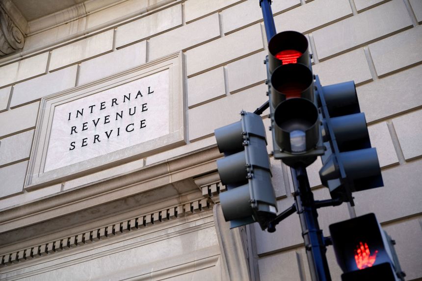 A traffic light is red outside the Internal Revenue Service building in Washington, DC, on February 20.