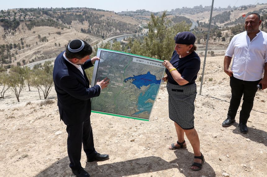 Israeli Finance Minister Bezalel Smotrich shows a map of the controversial E1 settlement scheme that would split occupied Palestinian territories into two.