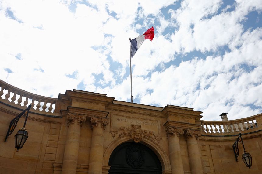 A French flag flies above the entrance of the Hotel Matignon, the official residence of the French Prime Minister, on Monday, as François Bayrou lost the confidence vote.