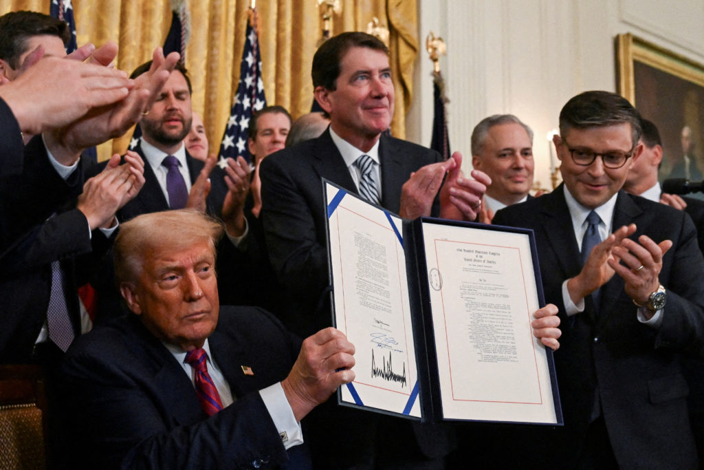 FILE PHOTO: FILE PHOTO: Signing ceremony for the "Genius Act", at the White House in Washington
