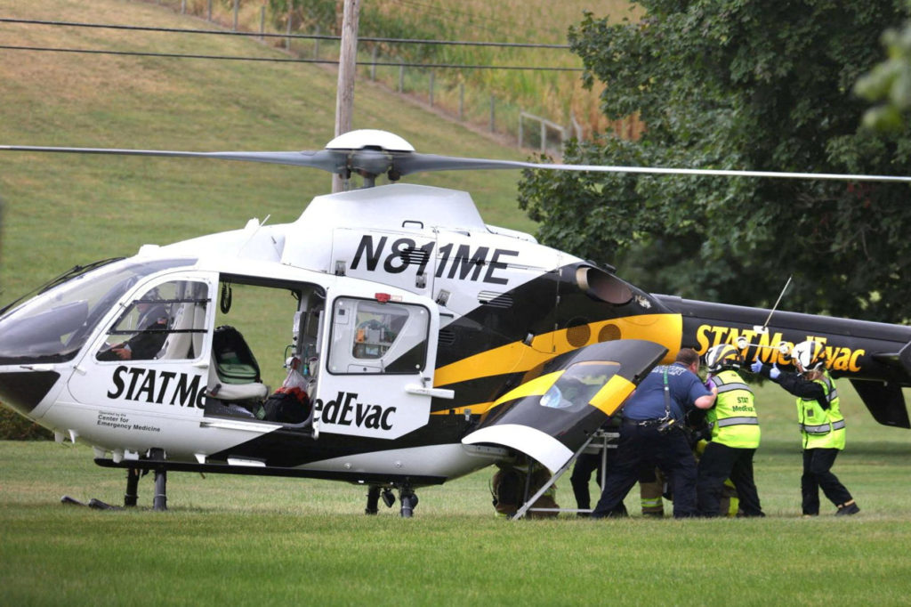 A police officer is loaded into a Medevac helicopter after a shooting incident in York County's North Codorus Township