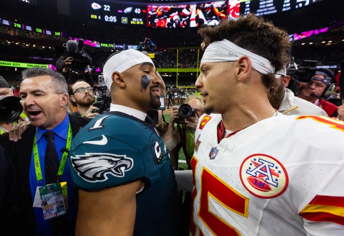 Jalen Hurts and Patrick Mahomes greet each other after the Super Bowl.