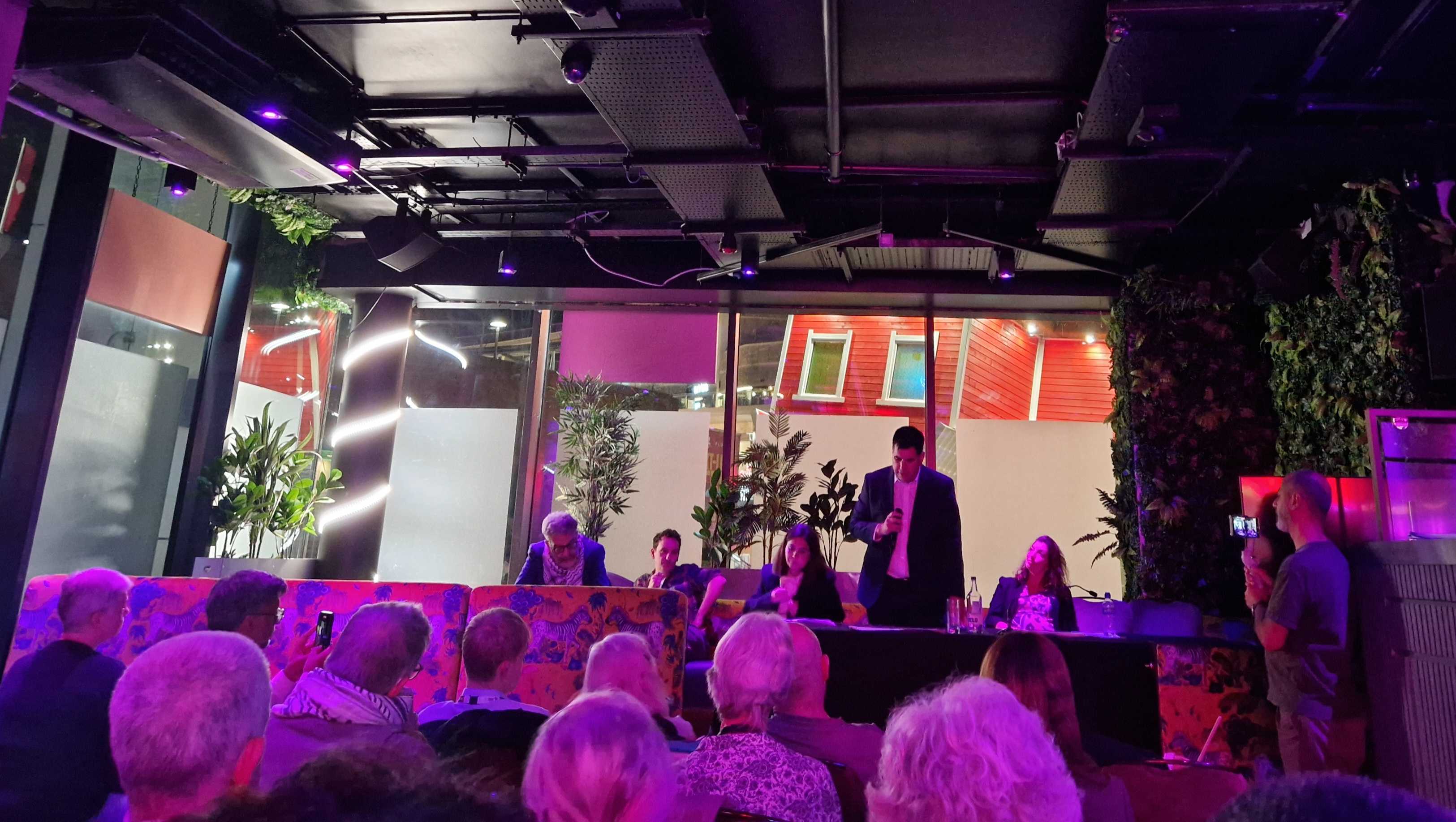Labour MP Richard Burgon addresses a conference fringe event at the Hilton in Liverpool on Sunday evening. (Imran Mulla/MEE)