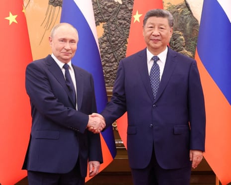 The two leaders shake hands