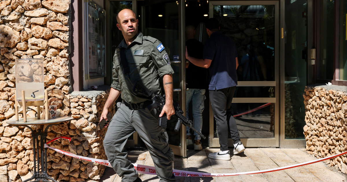 2 people are stabbed at a hotel outside Jerusalem. Israeli police say it's a militant attack