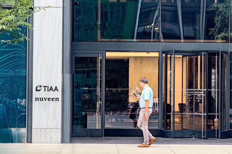TIAA and Nuveen office building, building exterior and sidewalk scene, 730 Third Avenue, Manhattan, New York City, New York, USA