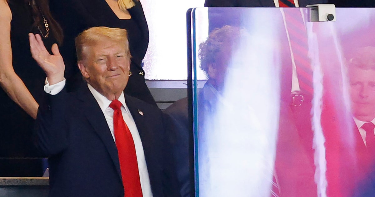 Trump draws cheers and boos while marking 9/11 by attending a New York Yankees game