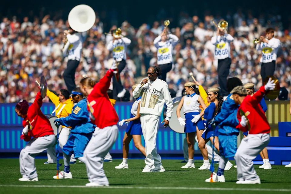 Seen here, Snoop Dogg taking centre stage at the MCG for an incredible AFL grand final pre-game show. 