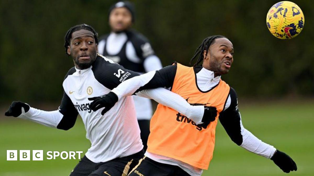 Axel Disasi and Raheem Sterling jockey for a ball in training