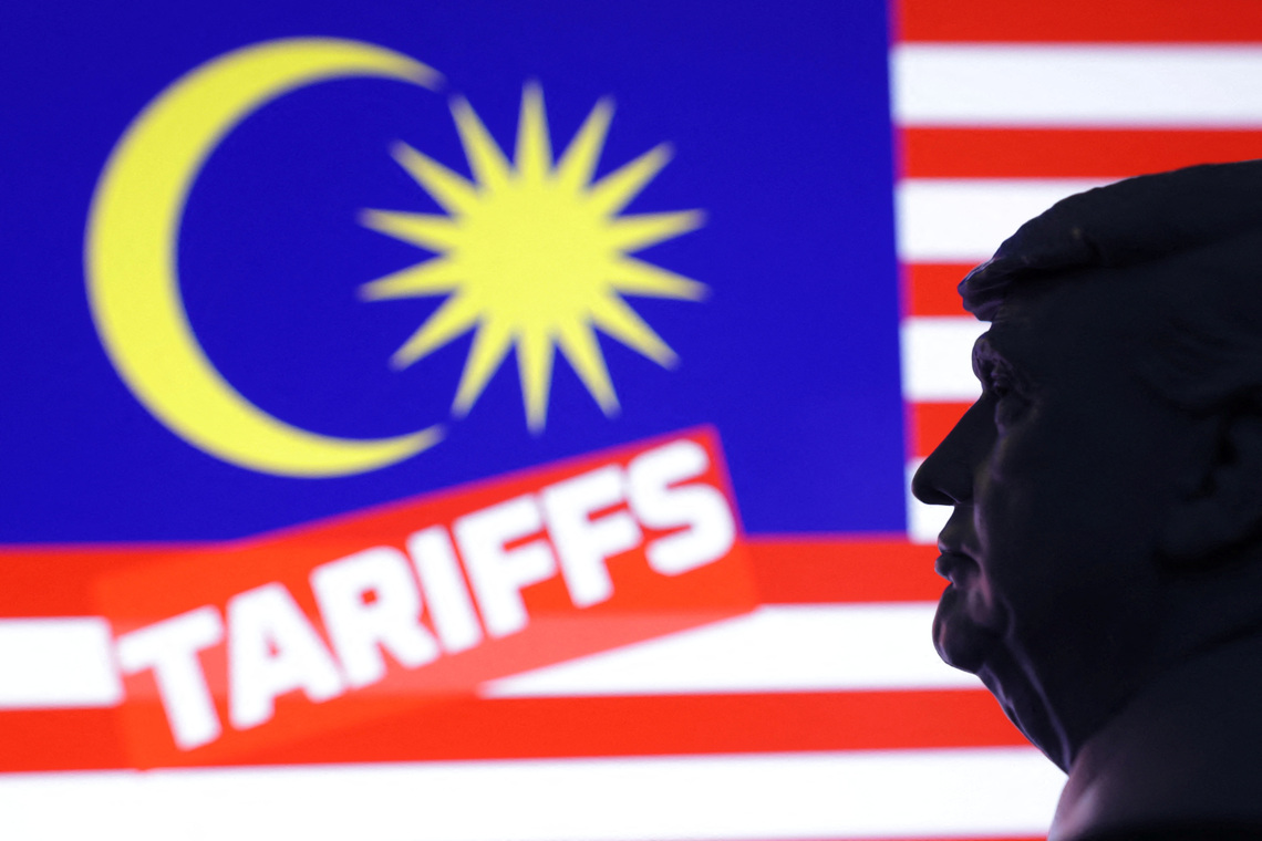 FILE PHOTO: A 3D-printed miniature model of U.S. President Donald Trump, the Malaysia flag and the word "Tariffs" are seen in this illustration taken July 23, 2025. REUTERS/Dado Ruvic/Illustration/File Photo