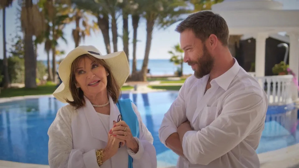 Pictured (L to R): Stephanie Beacham as Lady Gloria Whitten-Soames and Peter Andre as George Constantinos in 'The Sunshine Murders'UPtv