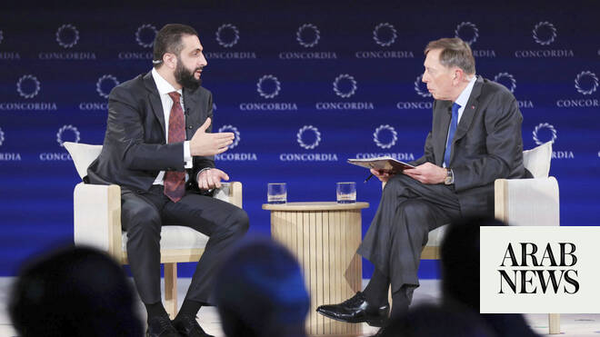 New Syria leader, in US, plays down Israel normalization