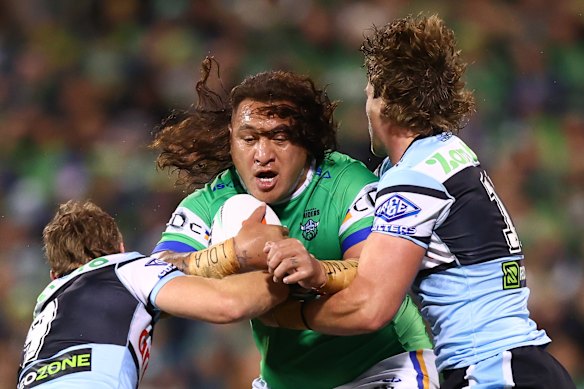 Josh Papali’i of the Raiders is tackled. 