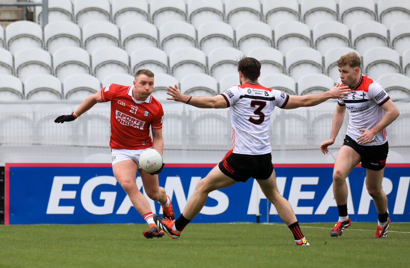 Cork's Brian Hurley tries to go past Louth's Dermot Campbell earlier this year. Picture: David Creedon