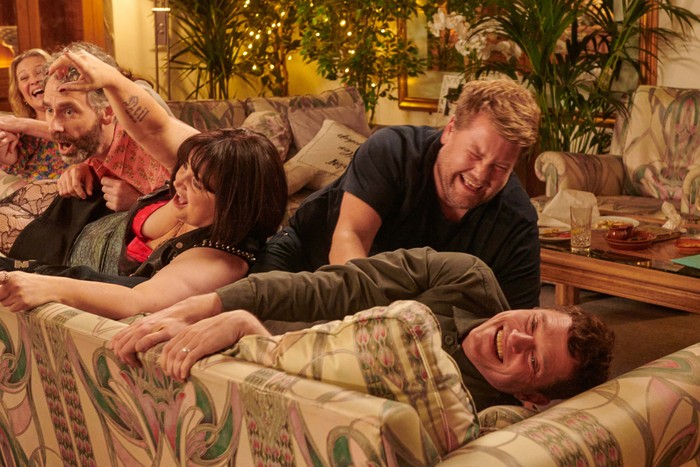 The cast of Gavin & Stacey's 2024 Christmas special laughing together on the sofa