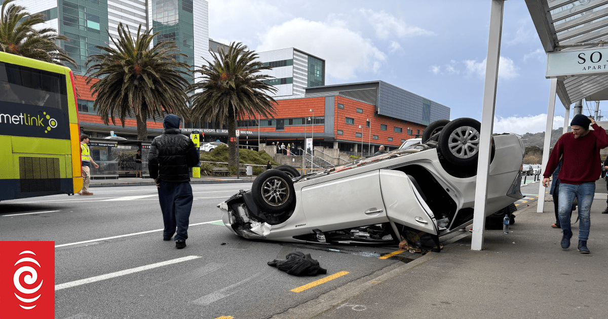 Car flips onto roof on central Wellington street