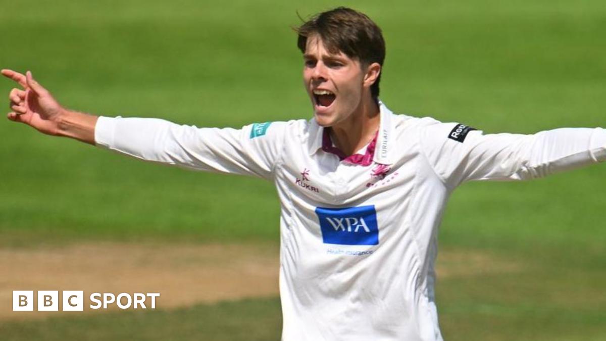 Archie Vaughan with arms outstretched appeals against Hampshire