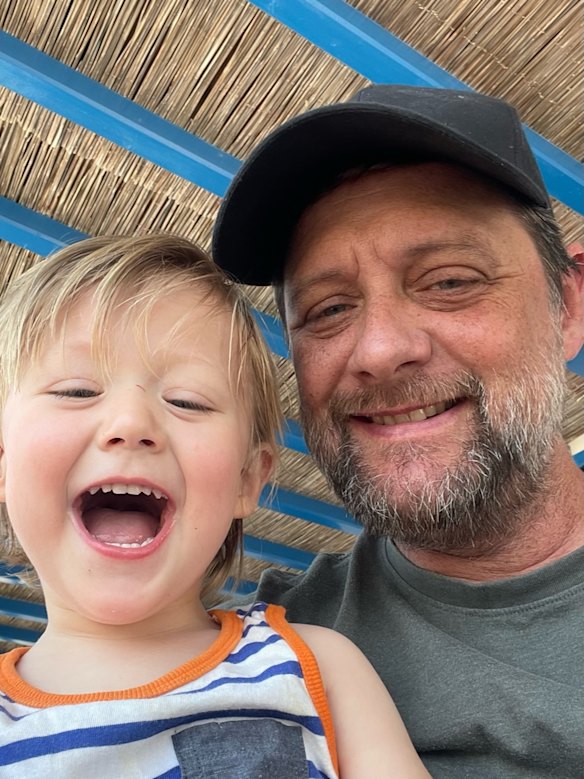 Shane Nicholson with his youngest child Jude, 3.