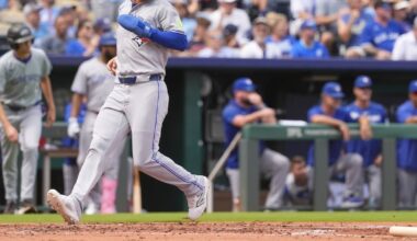 Blue Jays clinch playoff spot with 8-5 win over Royals