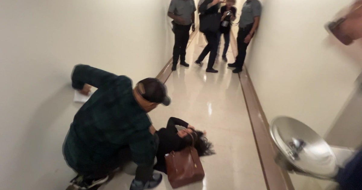 ICE officer seen on video pushing woman to ground has returned to duty