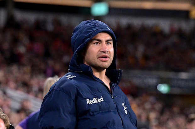 BRISBANE, AUSTRALIA - SEPTEMBER 04: Jahrome Hughes of the Storm is seen watching on after injuring his hand during the round 27 NRL match between Brisbane Broncos and Melbourne Storm at Suncorp Stadium, on September 04, 2025, in Brisbane, Australia. (Photo by Bradley Kanaris/Getty Images)