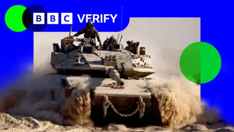 BBC An Israeli tank manoeuvres at the Israel-Gaza border, as seen from Israel, 26 August 2025 (copyright: REUTERS/Amir Cohen). BBC Verify branding in blue and green has been added - with BBC Verify written in white lettering.