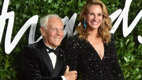 Getty Images Giorgio Armani on the red carpet with Julia Roberts in 2019