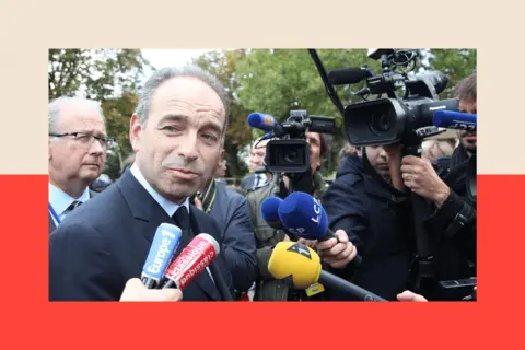 Eric COLOMER/Gamma-Rapho via Getty Images Jean-Francois Cope speaks to reporters