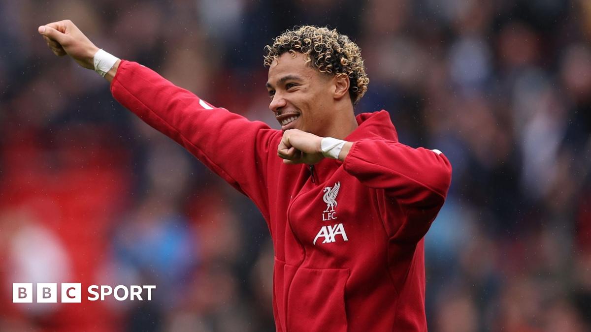 Hugo Ekitike acknowledges the acclaim of Liverpool's fans after the Merseyside derby win against Everton at Anfield