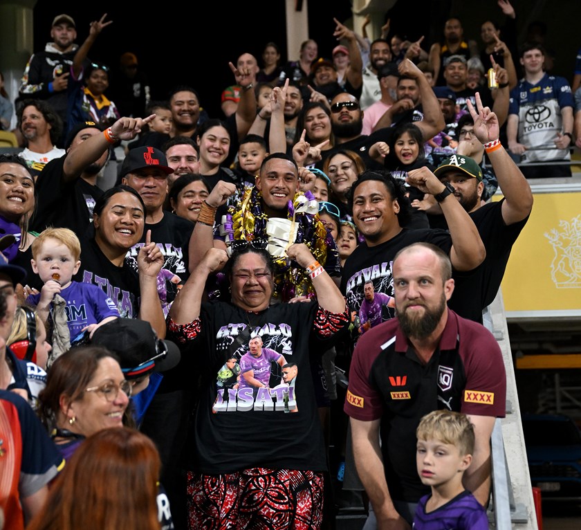 Ativalu Lusati with family members, including his parents, after making his NRL debut in Townsville.