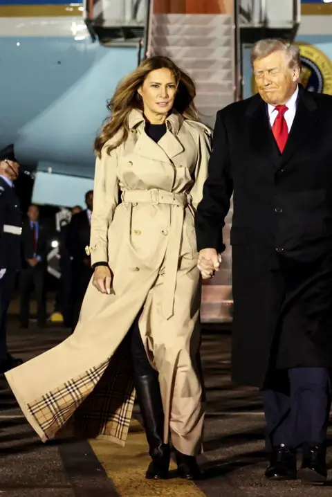 Reuters US President Donald Trump and first lady Melania Trump are welcomed by Viscount Henry Hood upon arrival at London Stansted Airport for a state visit to Britain, near London, Britain, September 16, 2025. 