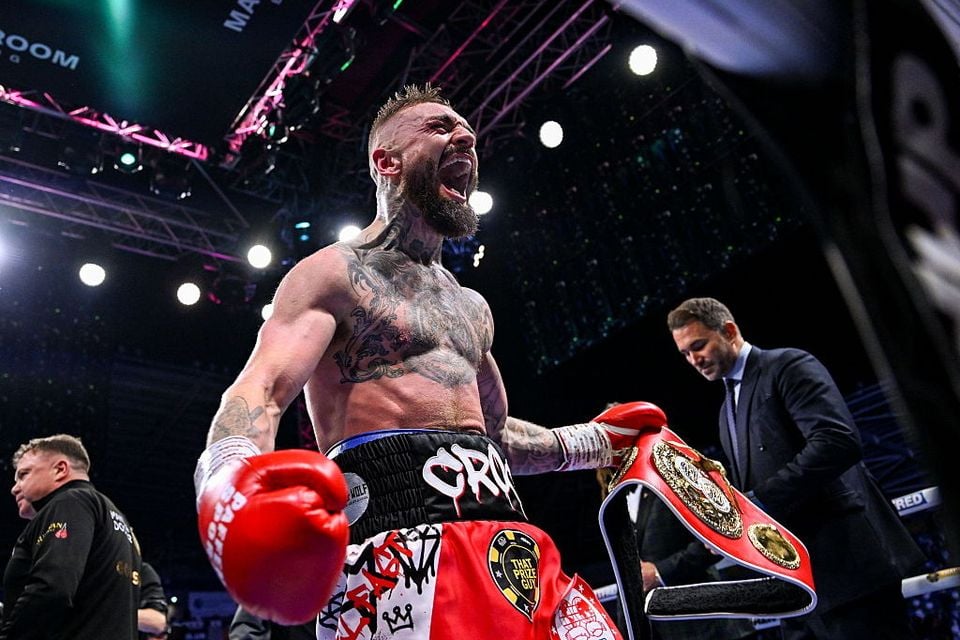 Lewis Crocker celebrates defeating Paddy Donovan in their IBF World Welterweight title bout(Photo By Ramsey Cardy/Sportsfile via Getty Images)