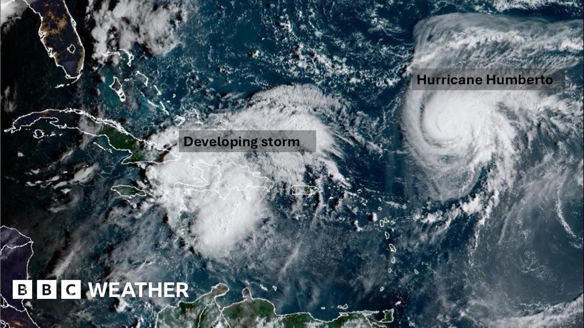 A satellite picture showing a new storm developing near to Hurricane Humberto