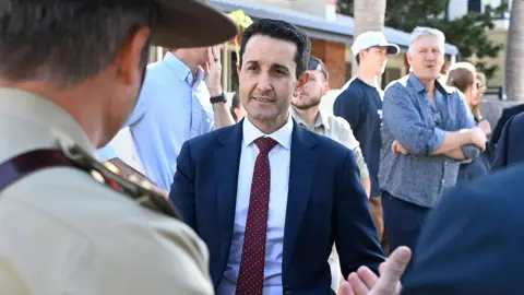 Getty Images David Crisafulli speaks to a soldier