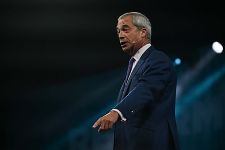 Nigel Farage delivers a speech at the annual Reform UK party conference at the National Exhibition Centre in Birmingham.