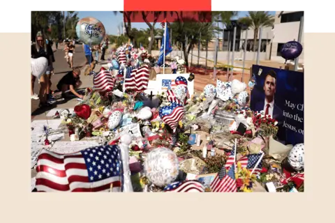 CHARLY TRIBALLEAU/AFP via Getty Image People gather at a makeshift memorial for Charlie Kirk outside of the Turning Point USA headquarters in Phoenix, Arizona