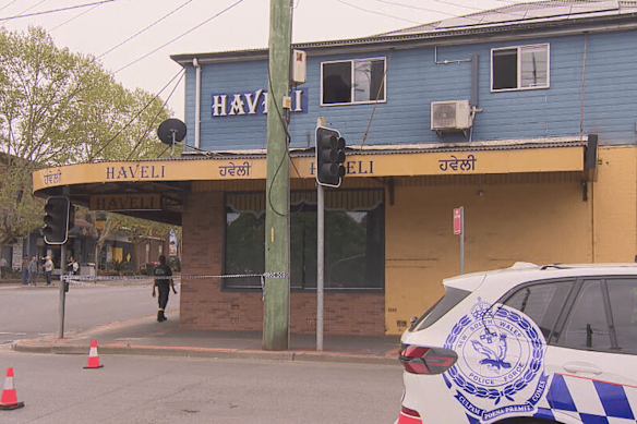 Police start investigations outside the Haveli Indian restaurant in Riverstone.